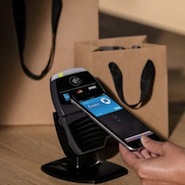 Apple Pay allows shoppers to use their phone to pay in-store