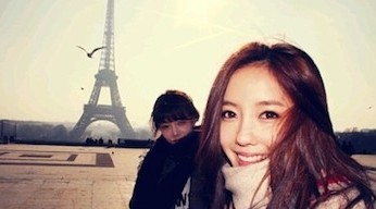 Picture posted on Weibo by Chinese tourists with Paris' Eiffel Tower in the background