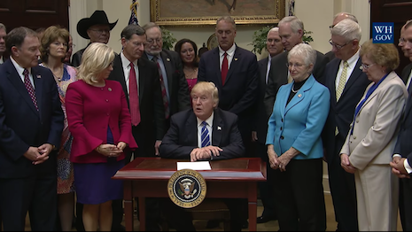 President Trump signing unrelated legislation March 27 at the White House