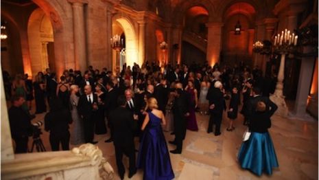 Guests mingling at an event hosted at the grand New York Public Library building in midtown Manhattan