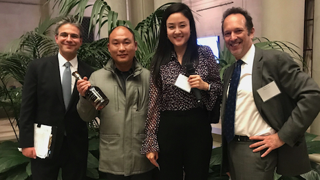 Madison Avenue Business Improvement CEO Matthew Bauer with Chinese tour guides at the Frick Collection on Fifth Avenue in New York. David Becker, CEO of Attract China, is at the opposite end